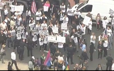LGBTQ Activists clash with concerned parents outside a school in California
