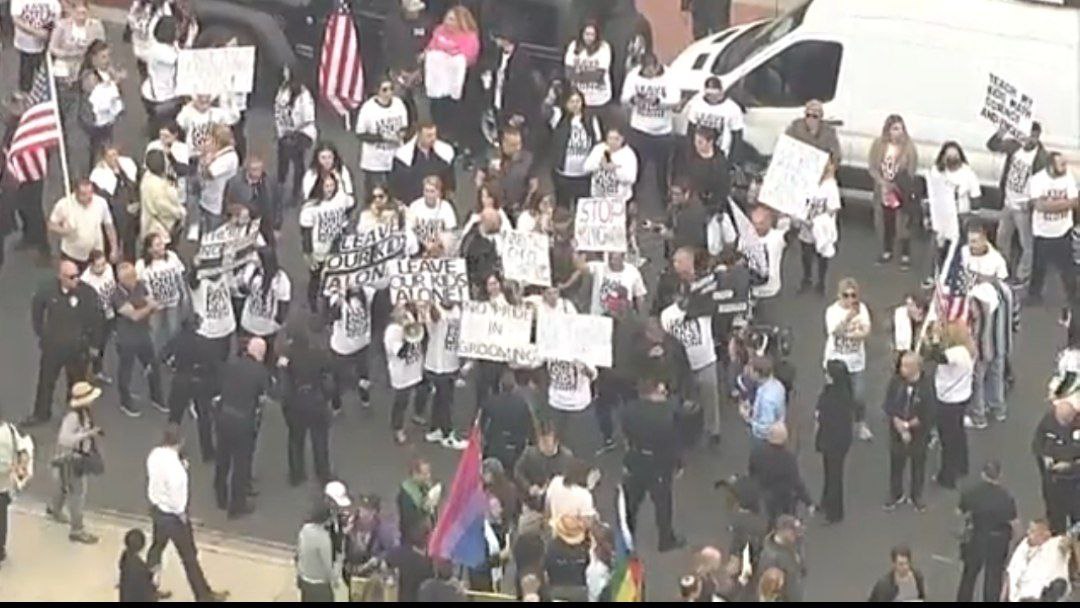 LGBTQ Activists clash with concerned parents outside a school in California
